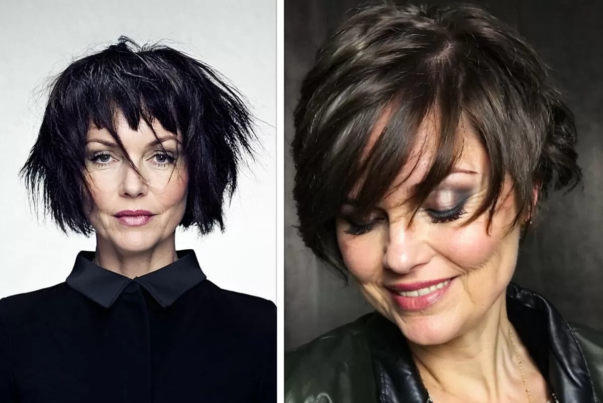 Fransig Pfiffige Kurzhaarfrisuren Frauen Frech Zwei elegante reife Frauen mit fransigen Kurzhaarfrisuren, eine in einem kantigen schwarzen Look und die andere mit geschmeidigen braunen Locken.